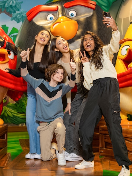 Group posing with Angry Birds characters at Angry Birds Mini Golf, American Dream.