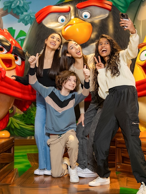Group posing with Angry Birds characters at Angry Birds Mini Golf, American Dream.