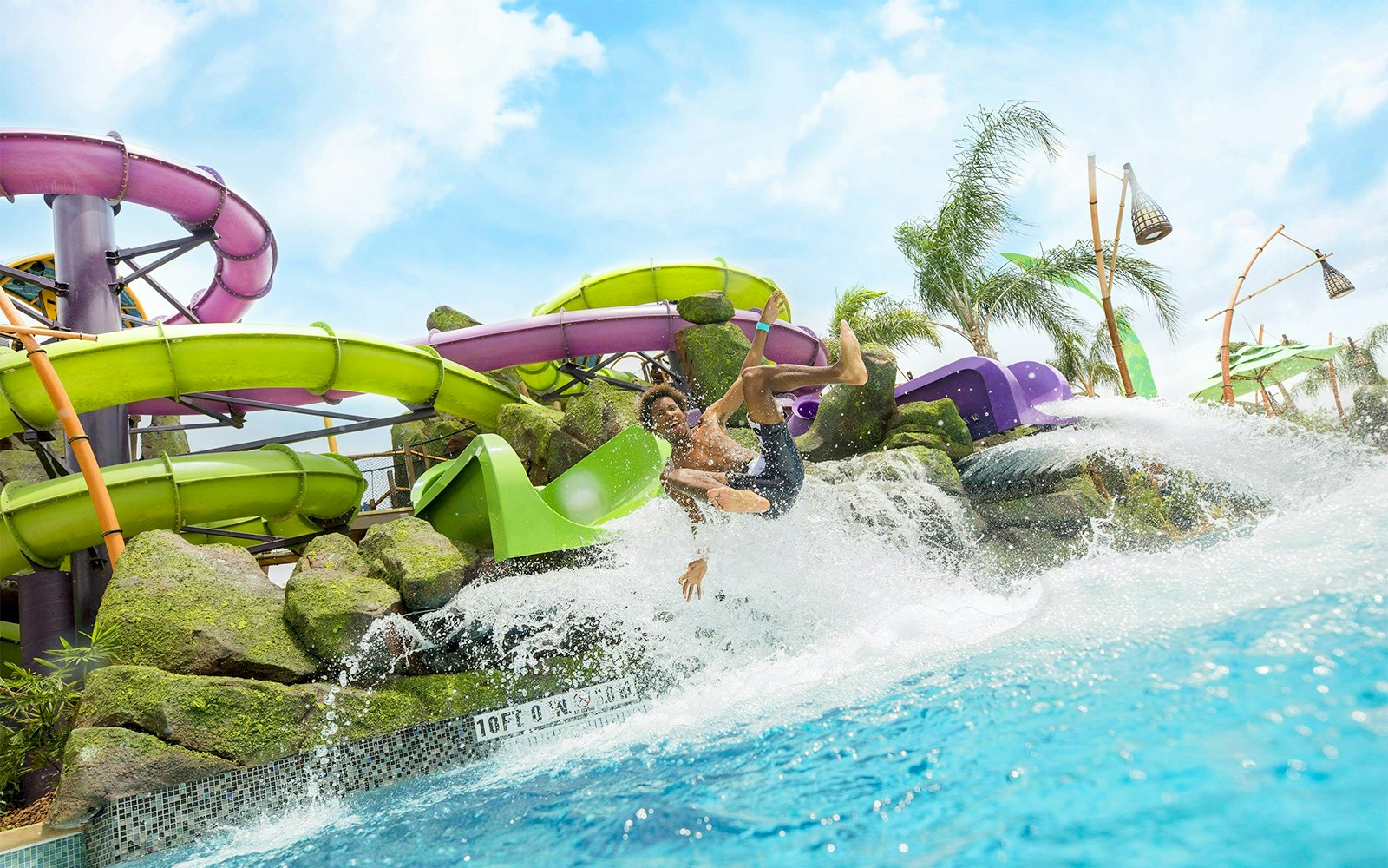 Guest sliding through a waterpark ride at the Universal Studios Resort Orlando, Florida
