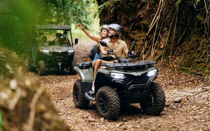 Quad bike tour through lush forest in Bel Ombre, Mauritius.