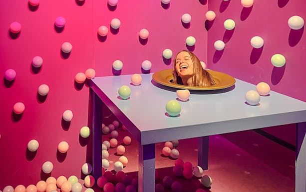 Guests enjoying interactive exhibit at Bubble Planet Berlin.