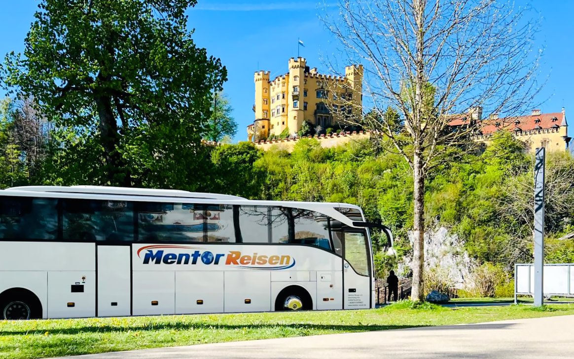 AC coach parked near Hohenschwangau Castle, Germany.