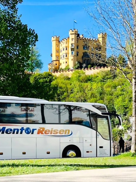 AC coach parked near Hohenschwangau Castle, Germany.