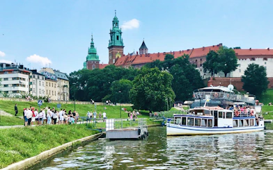 Boat tour on the Vistula River with Wawel Castle in the background, Cracow City Tour.