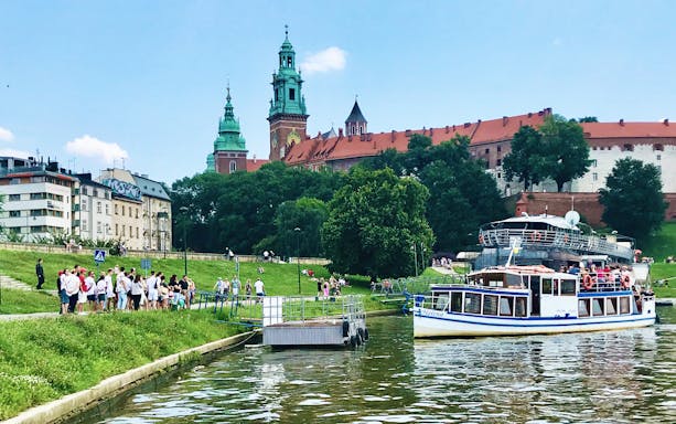 Boat tour on the Vistula River with Wawel Castle in the background, Cracow City Tour.