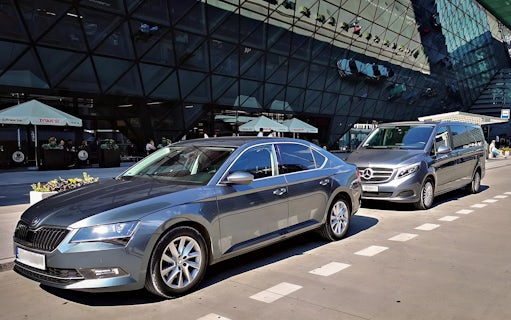 Transfer vehicles at Katowice Pyrzowice Airport for Krakow city route.