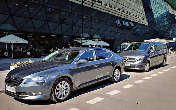 Transfer vehicles at Katowice Pyrzowice Airport for Krakow city route.
