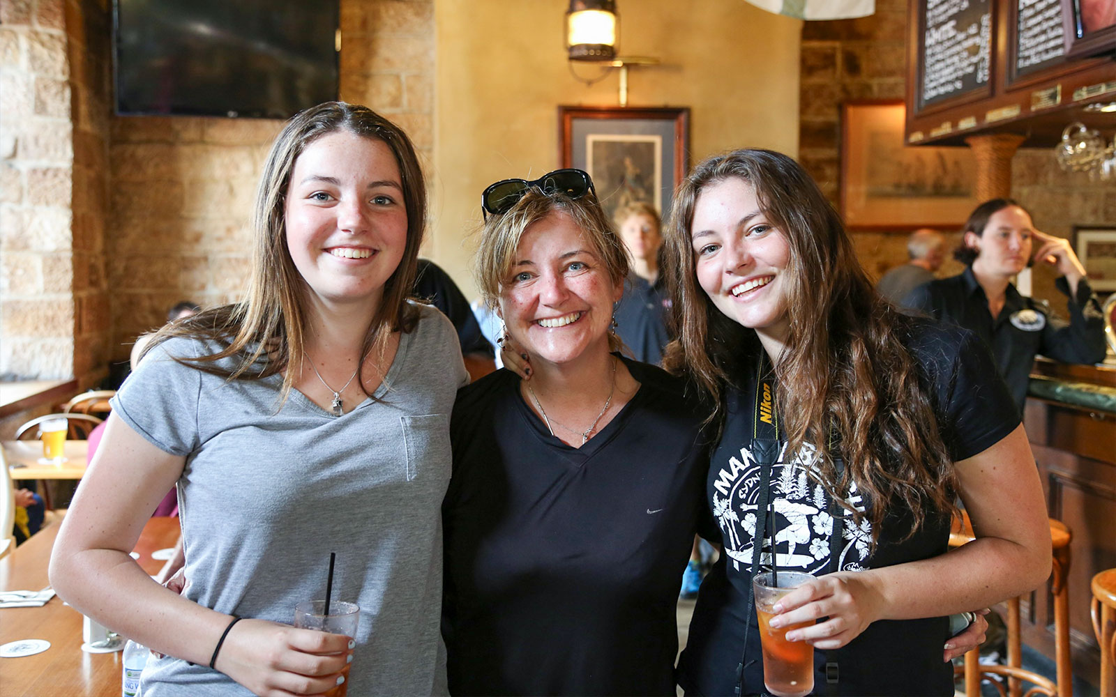 Group enjoying drinks at a local cafe during Bonza Bike Tours.