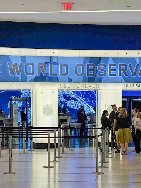 Entrance to One World Observatory with visitors in line, New York City.