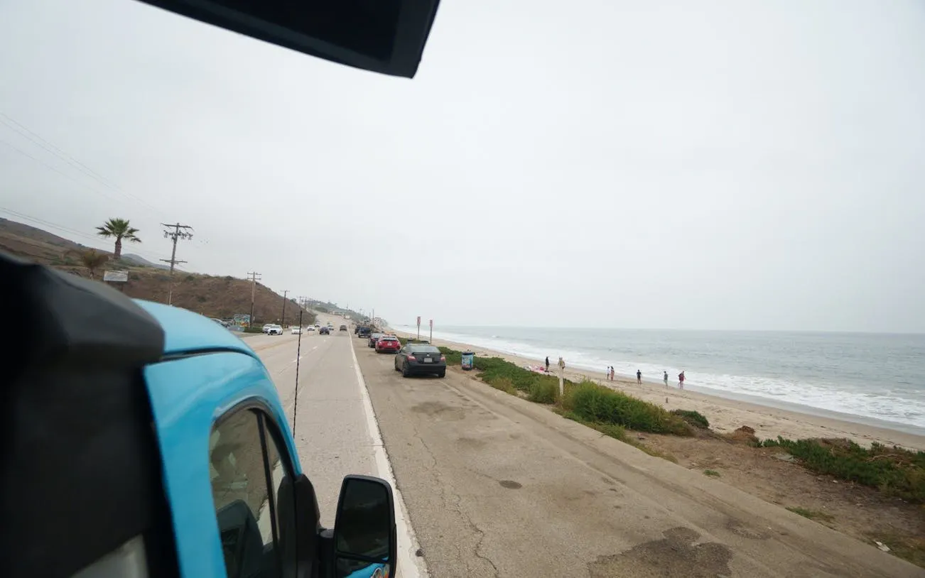 Open-air tour along Pacific Coast Highway with ocean view, Santa Monica to Malibu.