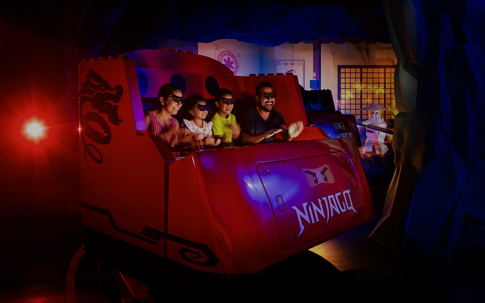 Visitors enjoying LEGO NINJAGO: The Ride at Legoland Florida.