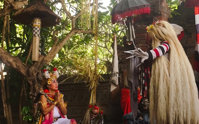 Performer in traditional costume during Uluwatu Kecak & Fire Dance Show, Bali.