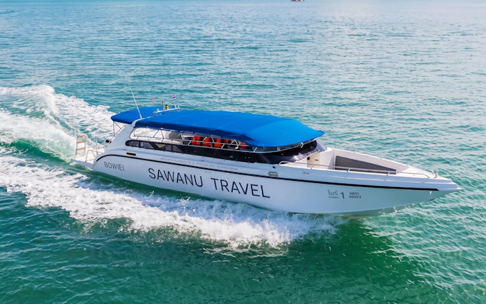 Speedboat cruising on clear waters during Phuket Phi Phi Khai Islands tour.