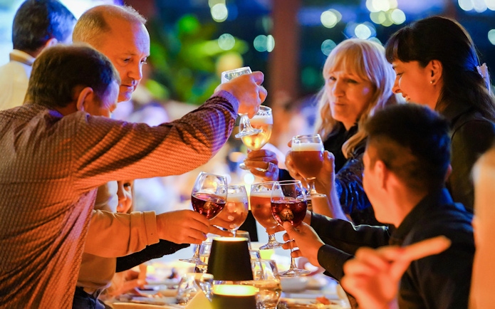 Guests toasting wine on Bosphorus 4-Course Dinner Cruise.