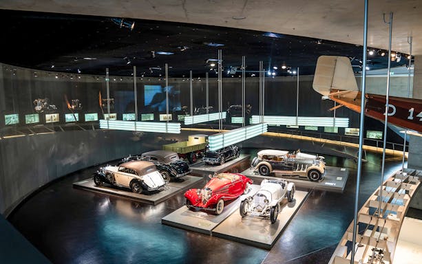Classic cars displayed inside Mercedes Benz Museum, Stuttgart.
