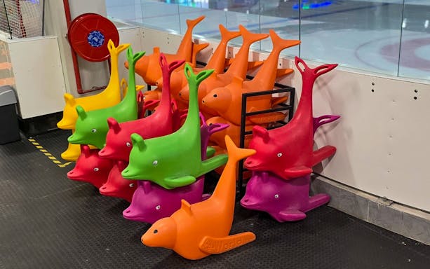 Colorful dolphin-shaped skating aids at Blue Ice Snow Park, Pavilion Bukit Jalil.