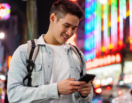 Man looking at cell phone