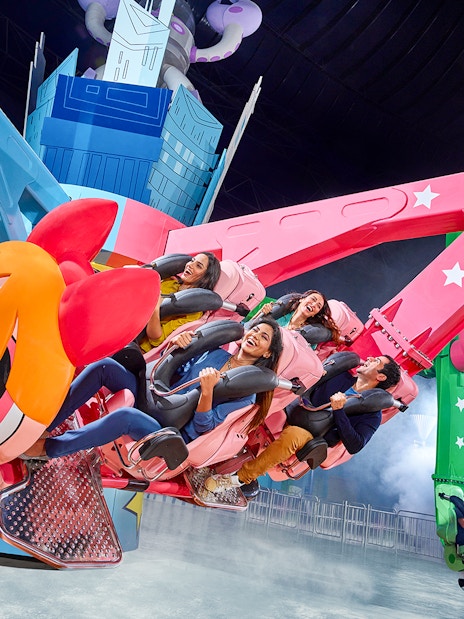 Visitors enjoying a themed ride at IMG Worlds of Adventure in Dubai.
