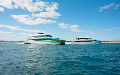 Ferry traveling from Hillarys to Rottnest Island across blue ocean waters.