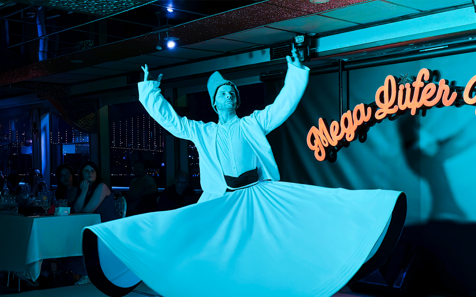 Dervish performing on Bosphorus dinner cruise with Turkish show and private table.