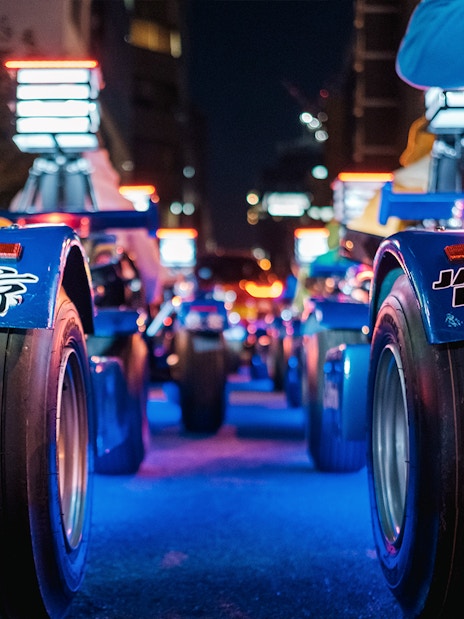 Go-karts lined up for a night tour in Shibuya and Shinjuku, Tokyo.