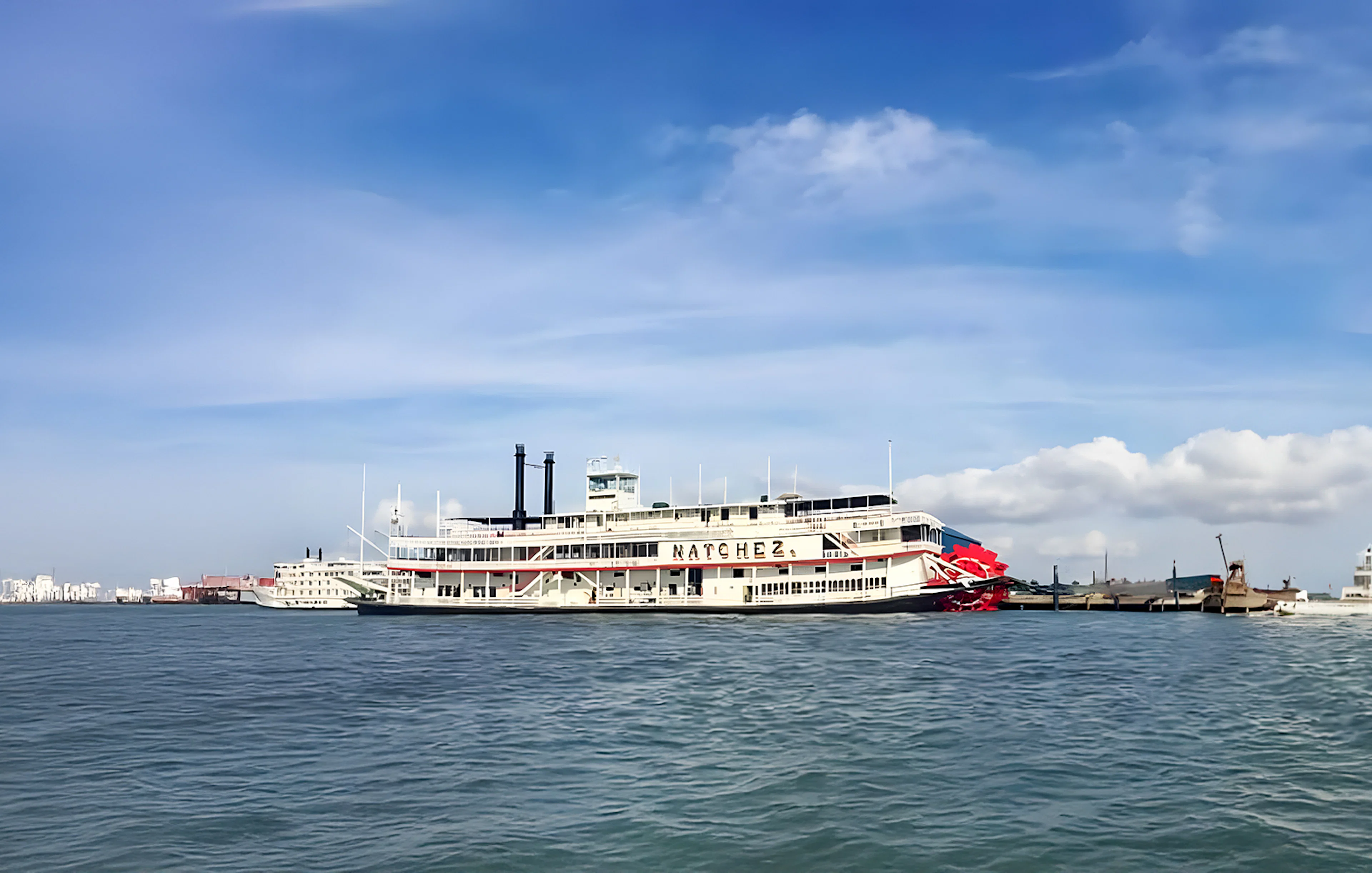 Steamboat Natchez cruising on the Mississippi River in New Orleans.