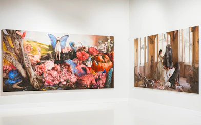 Visitors viewing Esplendor de la Noche artwork at Moco Museum, Barcelona.