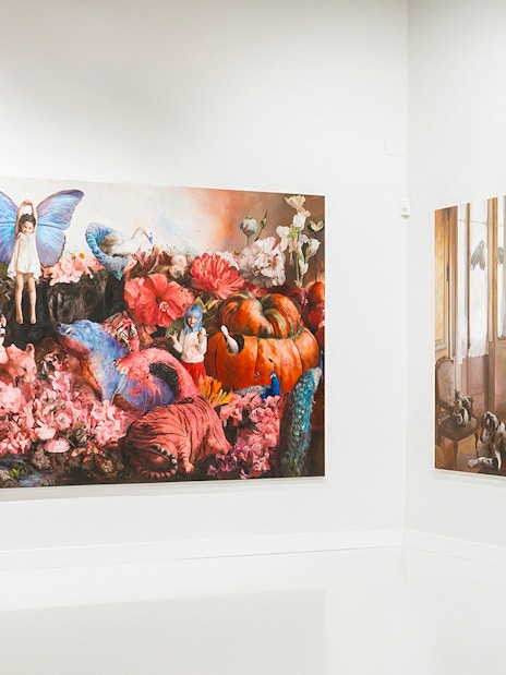 Visitors viewing Esplendor de la Noche artwork at Moco Museum, Barcelona.