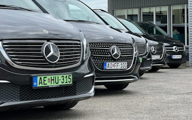 Mercedes vehicles lined up for Budapest private in-city door-to-door transfer.