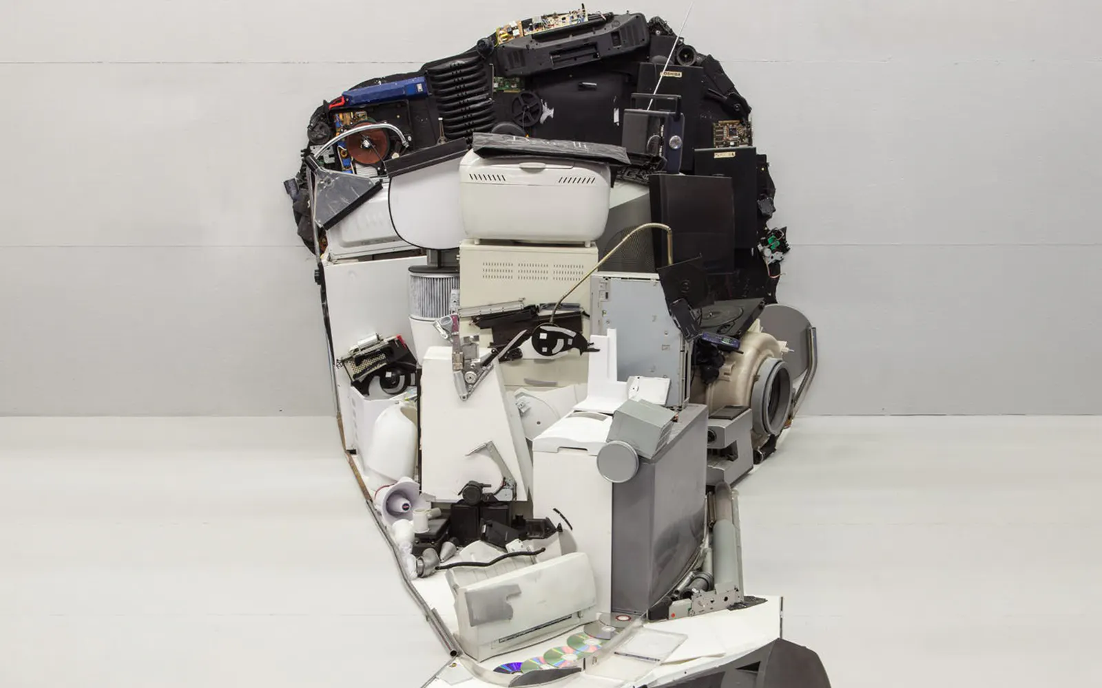 Collage of Nikola Tesla's face made from electronic parts at IAM Prague.