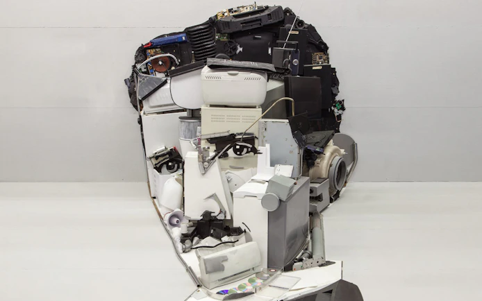 Collage of Nikola Tesla's face made from electronic parts at IAM Prague.