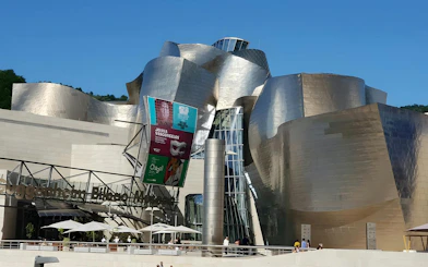Exterior of Guggenheim Museum Bilbao, showcasing Frank Gehry's unique architectural design.