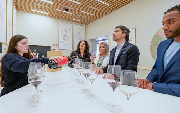 Wine tasting session with a group at The Wine Experience.