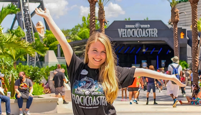 Visitor enjoying the VelociCoaster at Universal Orlando.