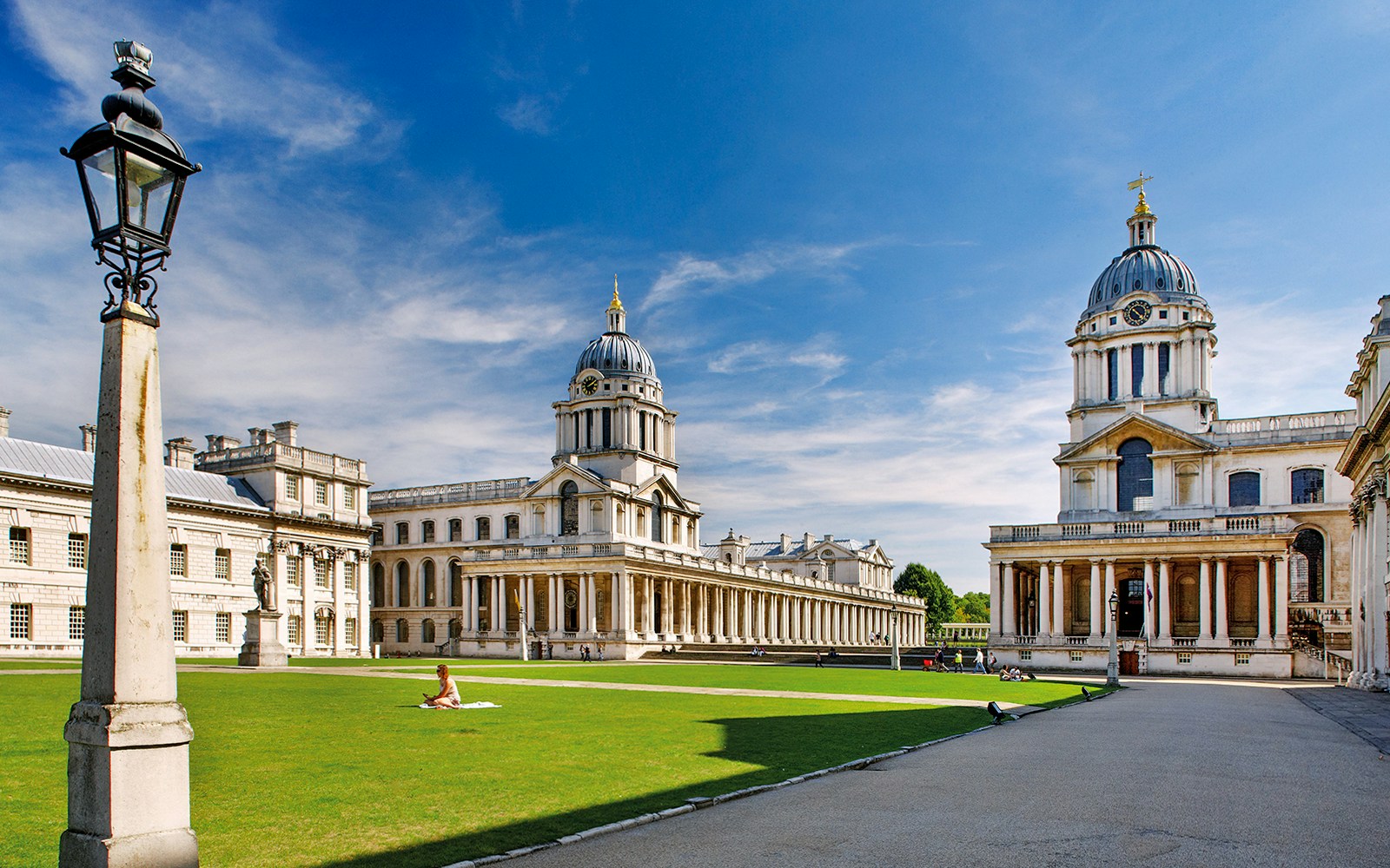 Old Royal Naval College courtyard with domed buildings in Greenwich, London.
