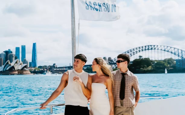Guests enjoying Chandon Harbour Long Lunch on The Jackson with Sydney Opera House and Harbour Bridge in view.
