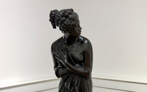 Sculpture of a woman inside Galleria Arte Moderna Nazionale.