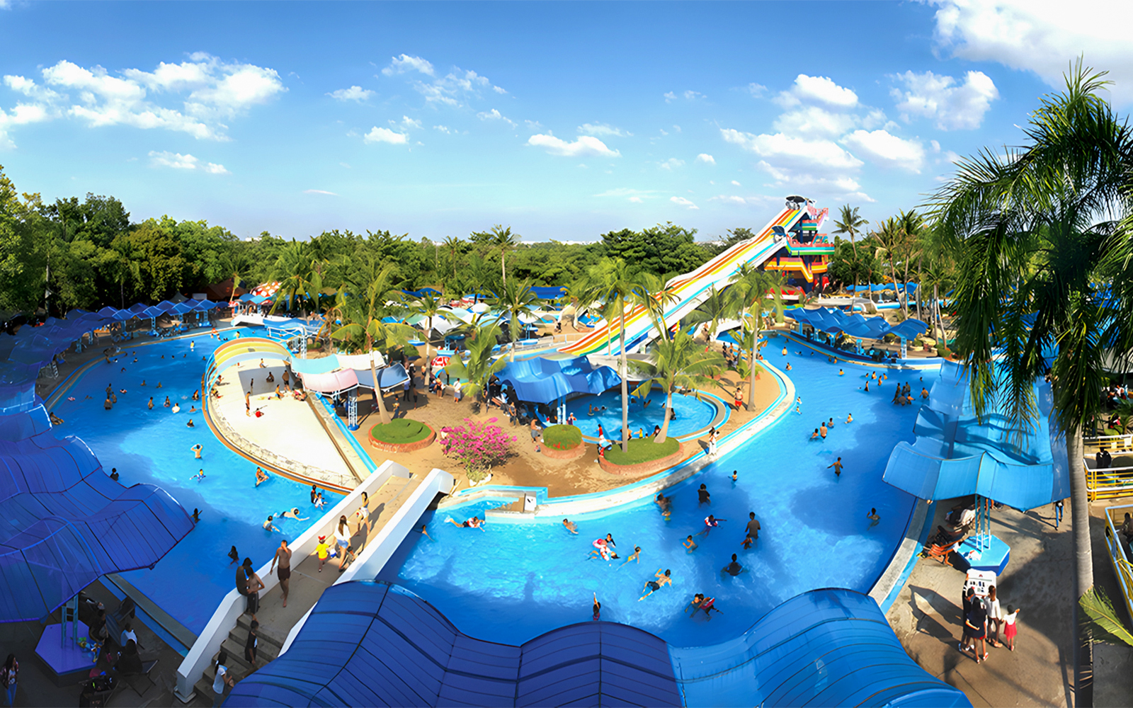 Visitors enjoying water slides at Water World, Siam Amazing Park, Bangkok.