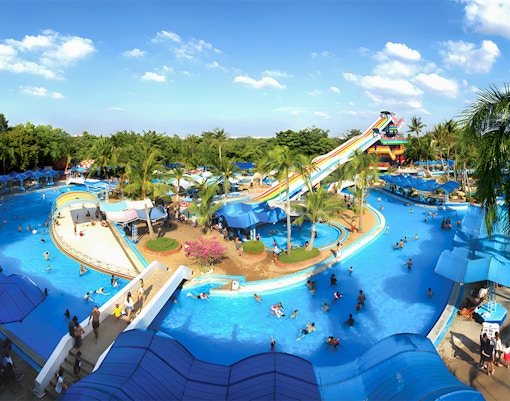 Visitors enjoying water slides at Water World, Siam Amazing Park, Bangkok.