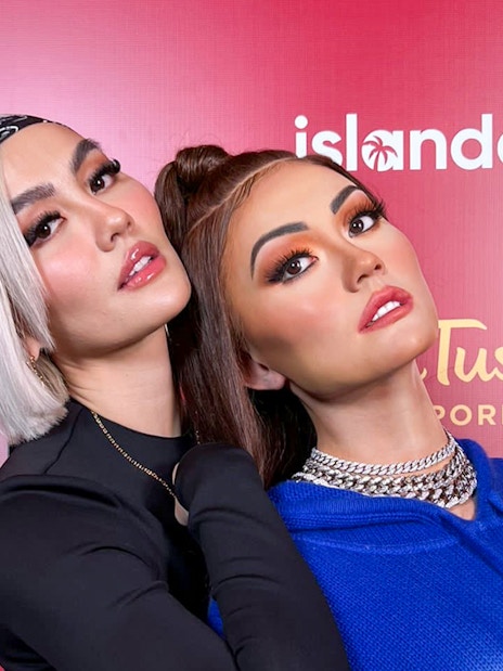 Wax figures at Madame Tussauds Singapore exhibit.