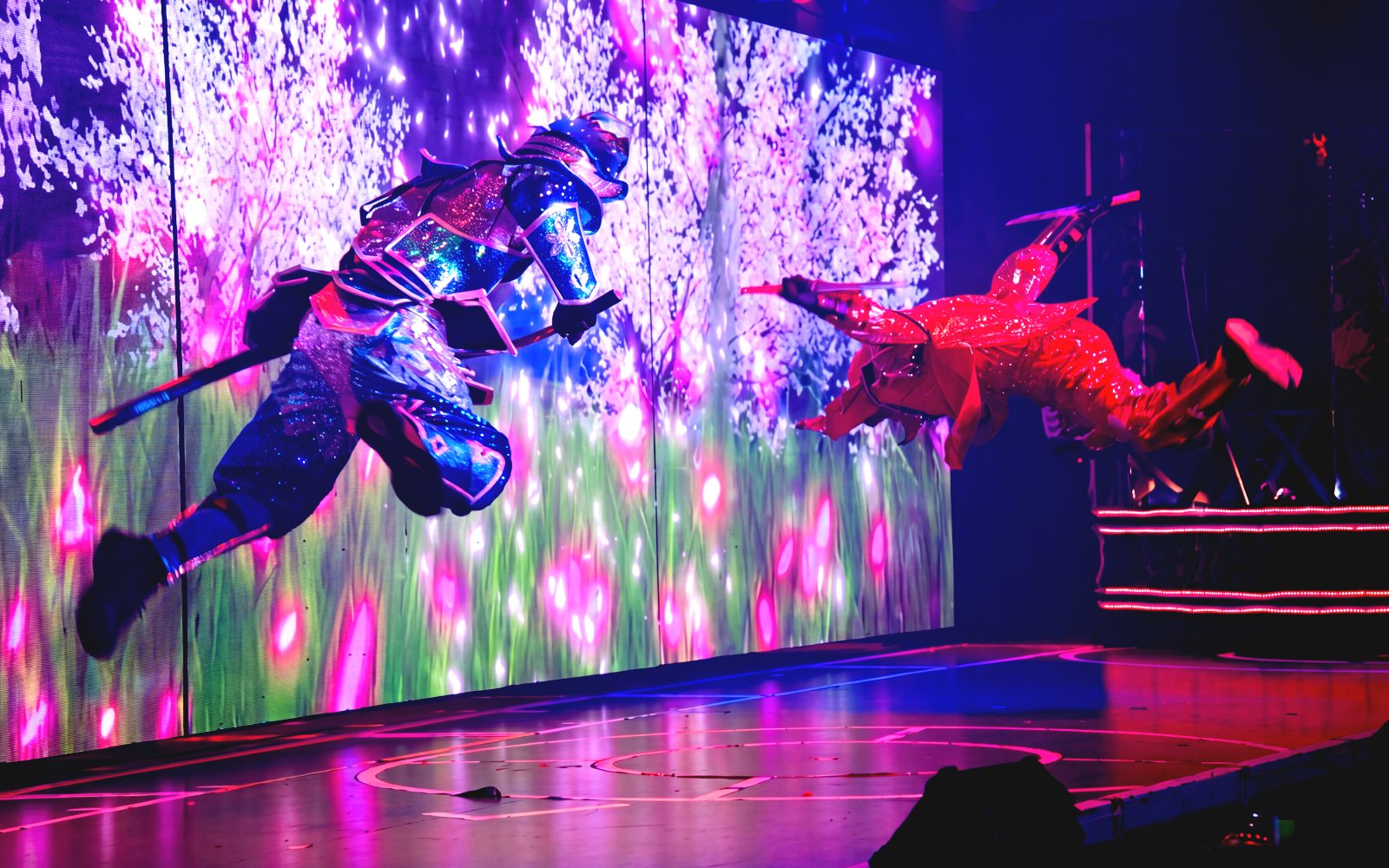 Samurai performers in vibrant costumes during a show in Kabukicho, Shinjuku, Tokyo.