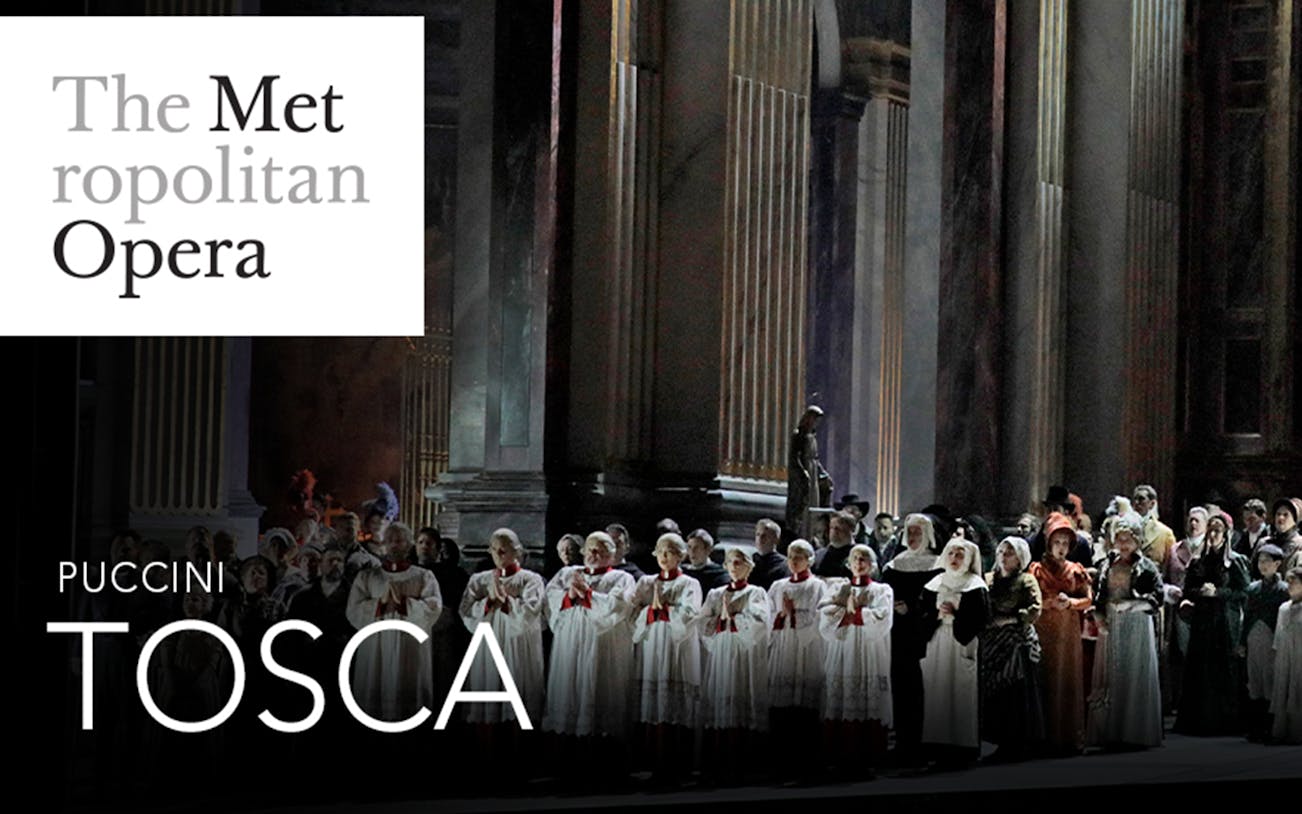 Metropolitan Opera performance of Puccini's Tosca with a large cast on stage.
