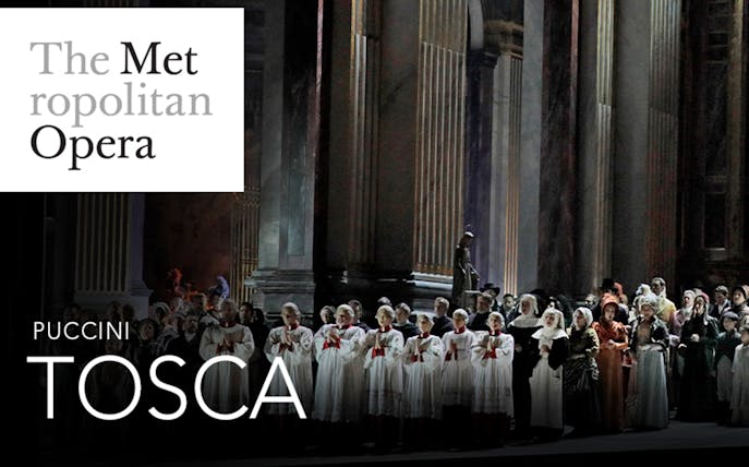 Metropolitan Opera performance of Puccini's Tosca with a large cast on stage.