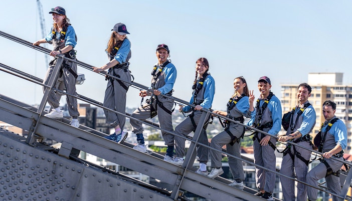 Group of people climbing the at Skypoint Observation Deck