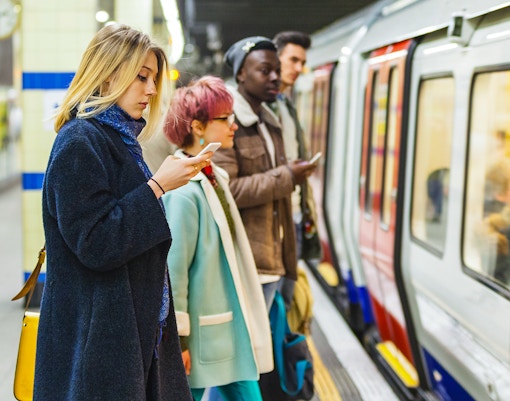 people waiting for london tube at London Bridge Station