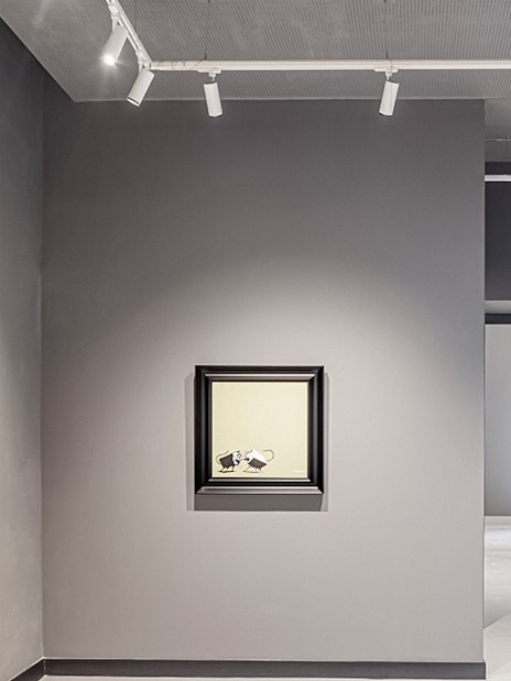 Banksy artwork featuring monkeys and rats at Moco Museum, Barcelona.