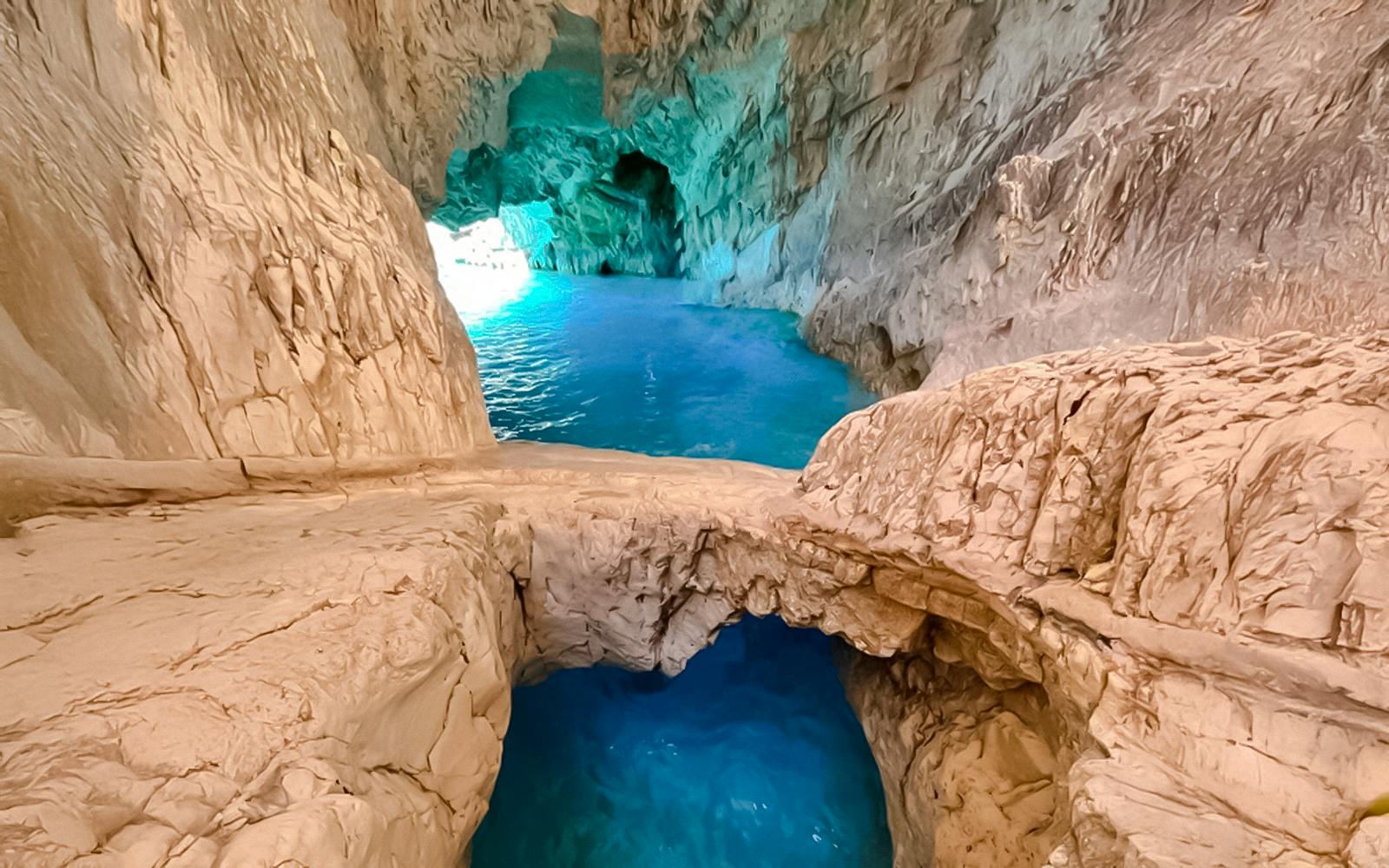 Blue caves with turquoise water inside Zakynthos, Greece.