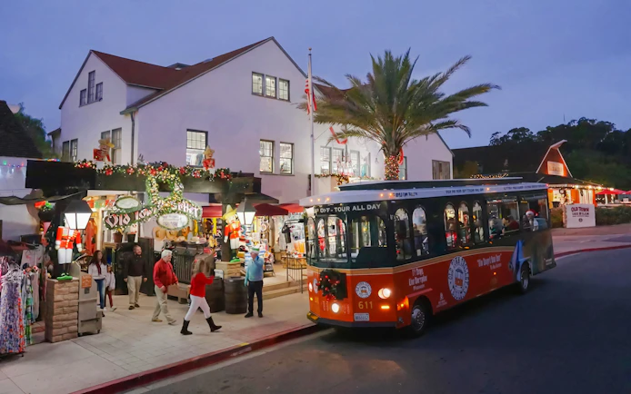 Old Town Trolley in San Diego decorated for Holiday Sights and Festive Nights Tour.