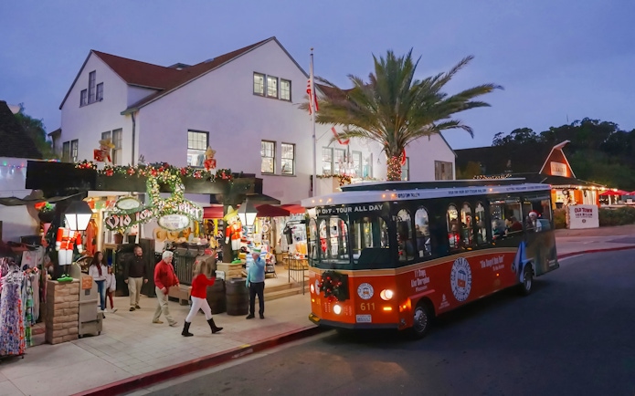 Old Town Trolley in San Diego decorated for Holiday Sights and Festive Nights Tour.