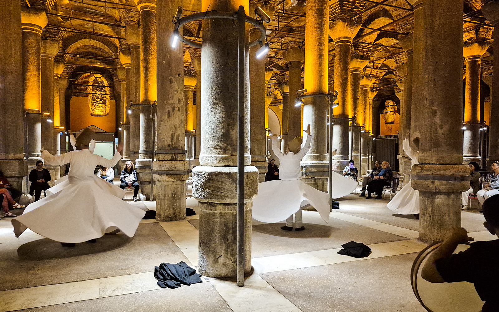 Whirling Dervish Ceremony in Istanbul's ancient columned hall.